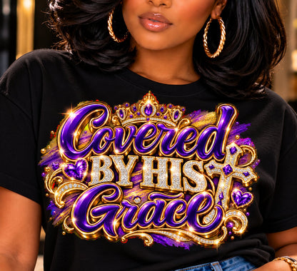 Covered by His Grace design in purple and gold on a black T-shirt, close-up