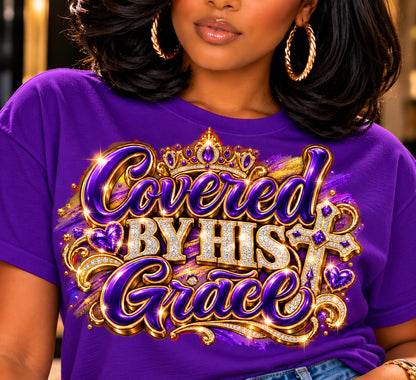 Covered by His Grace design in purple and gold on a purple T-shirt, close-up