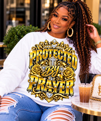 Protected By Prayer design in yellow on a white sweatshirt